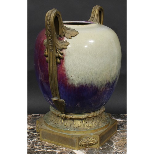 349 - A large ormolu mounted Chinese ovoid vase, glazed in the Jun ware manner in streaked tones of plum, ... 