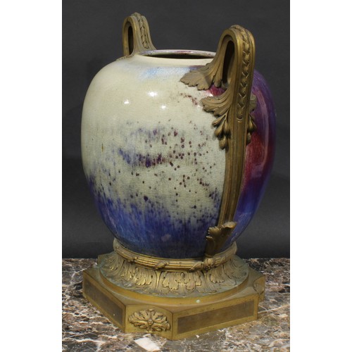 349 - A large ormolu mounted Chinese ovoid vase, glazed in the Jun ware manner in streaked tones of plum, ... 