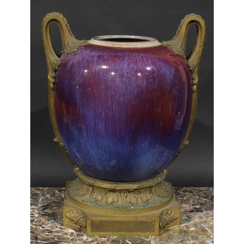 349 - A large ormolu mounted Chinese ovoid vase, glazed in the Jun ware manner in streaked tones of plum, ... 