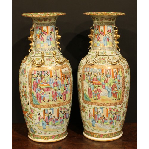 431 - A pair of Chinese ovoid vases, painted in the famille rose palette, in the Cantonese taste, 61cm hig... 