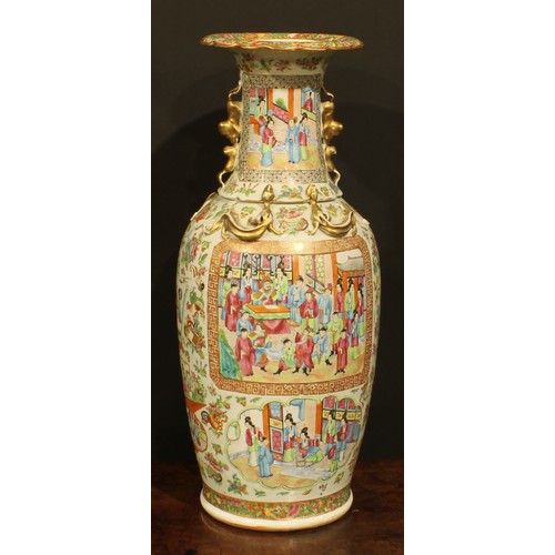 431 - A pair of Chinese ovoid vases, painted in the famille rose palette, in the Cantonese taste, 61cm hig... 