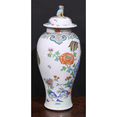 257 - A large 19th century famille rose ovoid vase and cover, painted in in polychrome enamels with flower... 