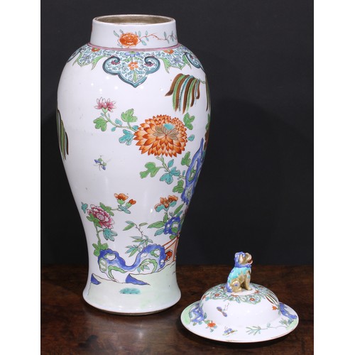 257 - A large 19th century famille rose ovoid vase and cover, painted in in polychrome enamels with flower... 