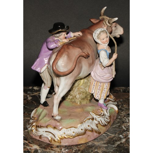 260 - A Meissen porcelain figure group, of a boy and girl with a bull, 22cm wide, incised R78, numbered 53... 