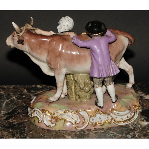 260 - A Meissen porcelain figure group, of a boy and girl with a bull, 22cm wide, incised R78, numbered 53... 