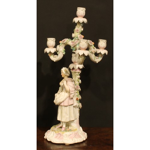 265 - A pair of Continental porcelain four-light table candelabra, figural bases, the branches encrusted w... 