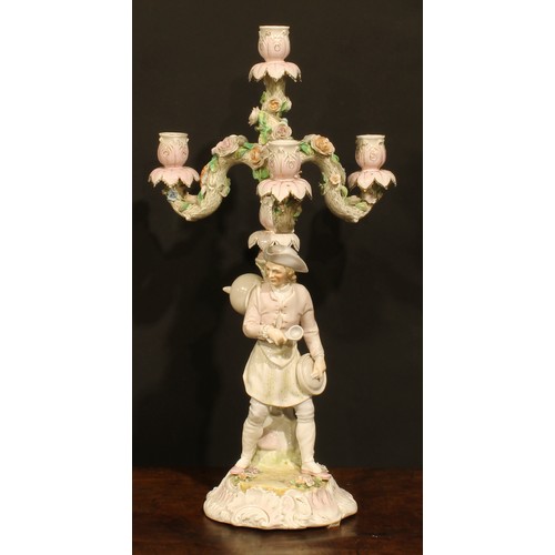 265 - A pair of Continental porcelain four-light table candelabra, figural bases, the branches encrusted w... 