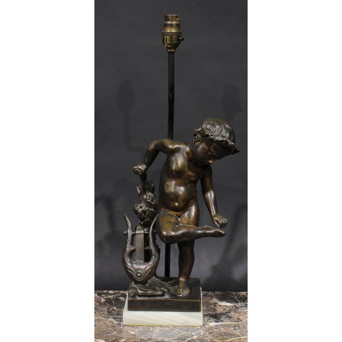 1642 - French School, 19th century, a brown patinated bronze, of a cherub with a lyre, later mounted as a t... 