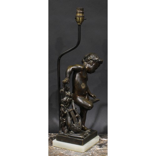 1642 - French School, 19th century, a brown patinated bronze, of a cherub with a lyre, later mounted as a t... 