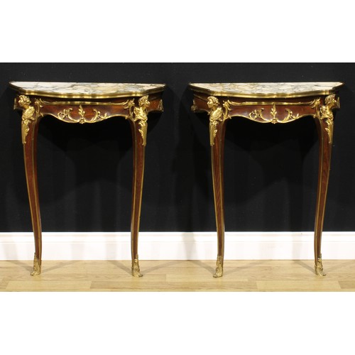 1540 - A pair of Louis XV style gilt metal mounted mahogany console tables, of small proportions, each with... 