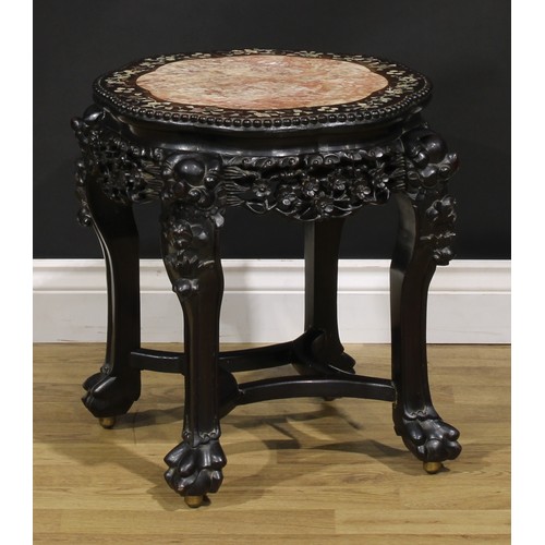 1299 - A Chinese hongmu and mother of pearl marquetry jardiniere stand, shaped circular top with beaded bor... 