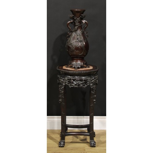 2065 - A Chinese hardwood jardiniere stand, shaped circular top with beaded border and inset marble panel, ... 