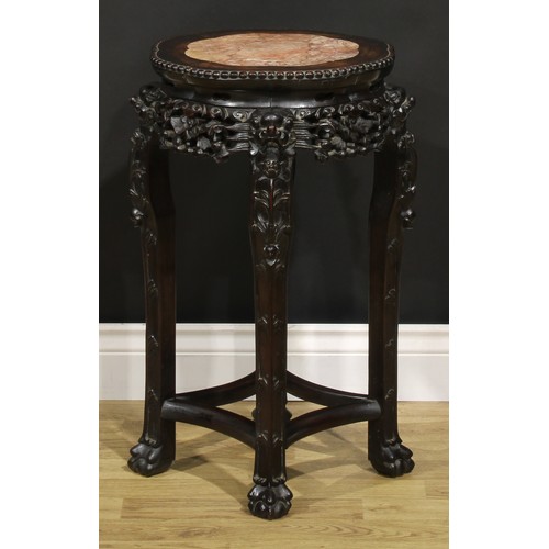 2065 - A Chinese hardwood jardiniere stand, shaped circular top with beaded border and inset marble panel, ... 