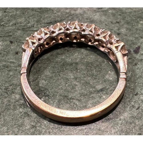 878 - A diamond half eternity ring, linear set with seven round brilliant cut diamonds, total estimated di... 