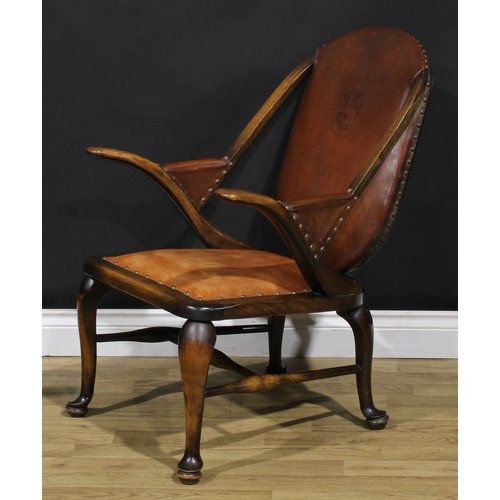 2103 - A pair of Art Deco period beech library club reading chairs, stuffed-over upholstery, the back with ... 