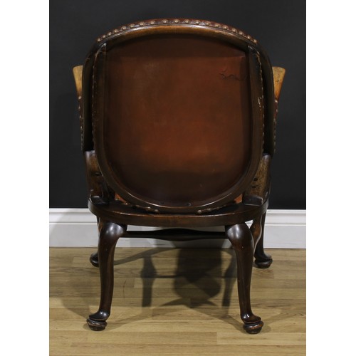 2103 - A pair of Art Deco period beech library club reading chairs, stuffed-over upholstery, the back with ... 