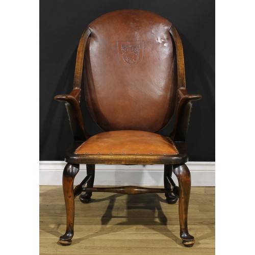 2103 - A pair of Art Deco period beech library club reading chairs, stuffed-over upholstery, the back with ... 