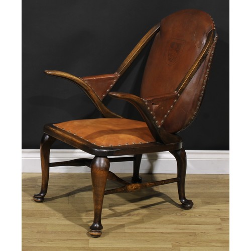 2103 - A pair of Art Deco period beech library club reading chairs, stuffed-over upholstery, the back with ... 