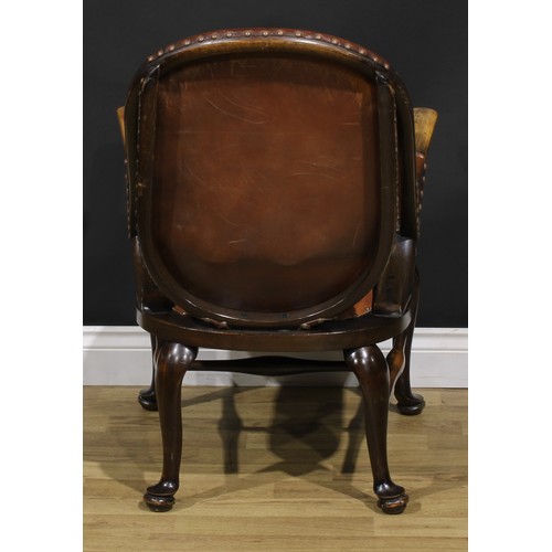 2103 - A pair of Art Deco period beech library club reading chairs, stuffed-over upholstery, the back with ... 