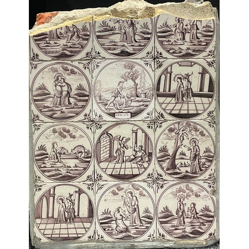 93 - A collection of 18th century Delft tiles, Biblical, landscape and flora