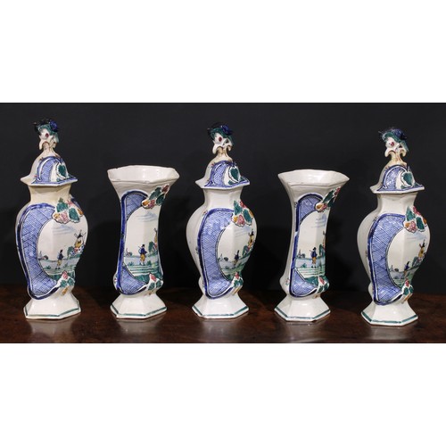 110 - An 18th century Delft five-piece garniture, decorated in polychrome with a traditional Dutch landsca... 