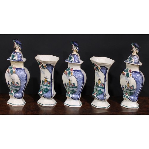 110 - An 18th century Delft five-piece garniture, decorated in polychrome with a traditional Dutch landsca... 