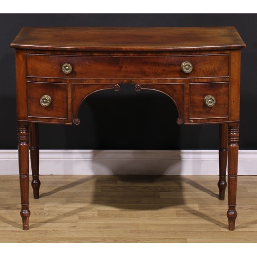 1546 - A Post-Regency mahogany bowfront side table, slightly oversailing top above three cockbeaded drawers... 