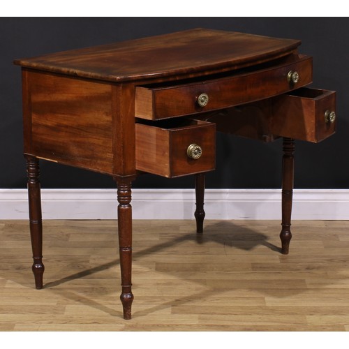 1546 - A Post-Regency mahogany bowfront side table, slightly oversailing top above three cockbeaded drawers... 