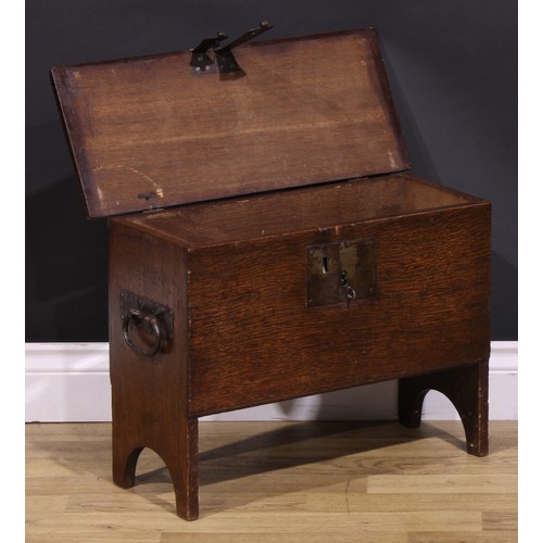 1279 - A 17th century style oak coffer bach or child’s six plank chest, hinged top with notched ends enclos... 