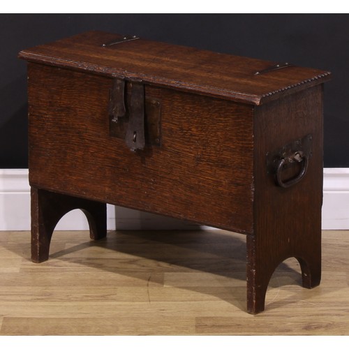 1279 - A 17th century style oak coffer bach or child’s six plank chest, hinged top with notched ends enclos... 