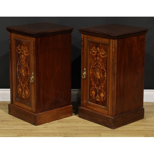 2171 - A pair of late Victorian mahogany and marquetry bedroom cabinets, each with a slightly oversailing t... 