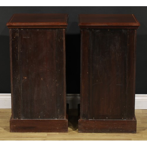 2171 - A pair of late Victorian mahogany and marquetry bedroom cabinets, each with a slightly oversailing t... 