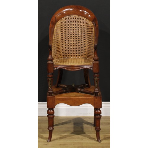 1475 - A Victorian mahogany child's metamorphic bergère high chair, the table base with turned forelegs, 96... 