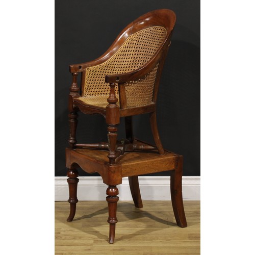 1475 - A Victorian mahogany child's metamorphic bergère high chair, the table base with turned forelegs, 96... 