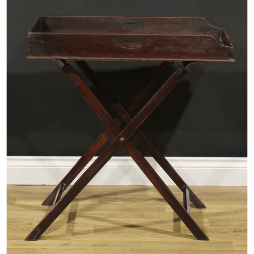 1243 - A 19th century mahogany butler’s serving tray on stand, 76cm high, 73.5cm wide, 46cm deep