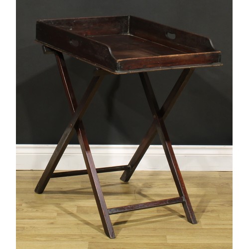 1243 - A 19th century mahogany butler’s serving tray on stand, 76cm high, 73.5cm wide, 46cm deep