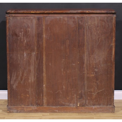 1479 - A Victorian mahogany open bookcase, rectangular top with moulded edge above two shelves, flanked by ... 