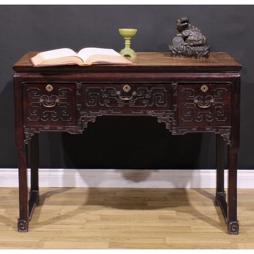 1658 - A Chinese hardwood altar table, waisted rectangular top above three frieze drawers, carved with styl... 