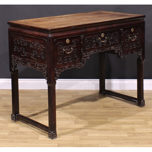 1658 - A Chinese hardwood altar table, waisted rectangular top above three frieze drawers, carved with styl... 