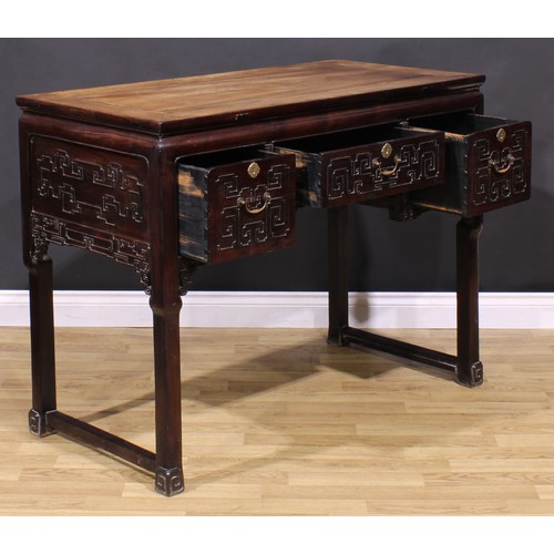 1658 - A Chinese hardwood altar table, waisted rectangular top above three frieze drawers, carved with styl... 