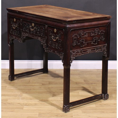 1658 - A Chinese hardwood altar table, waisted rectangular top above three frieze drawers, carved with styl... 