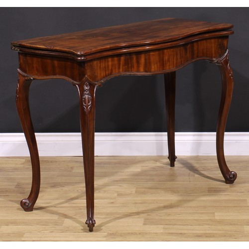 2170 - A pair of George III mahogany serpentine card tables, in the French Hepplewhite manner, each with a ... 