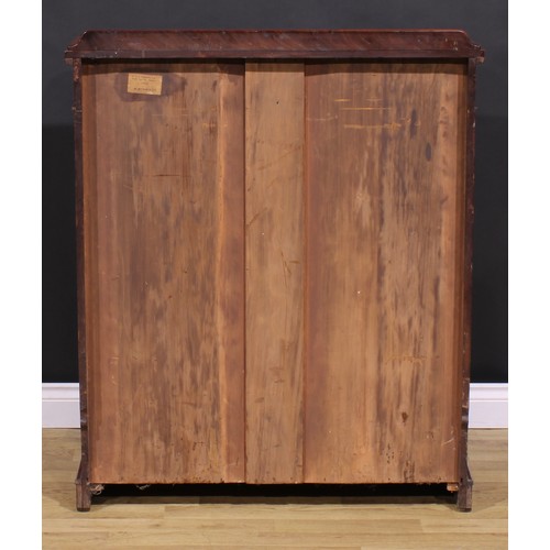 1477 - A Victorian mahogany housekeeper’s linen cupboard, slightly oversailing top with shallow half-galler... 