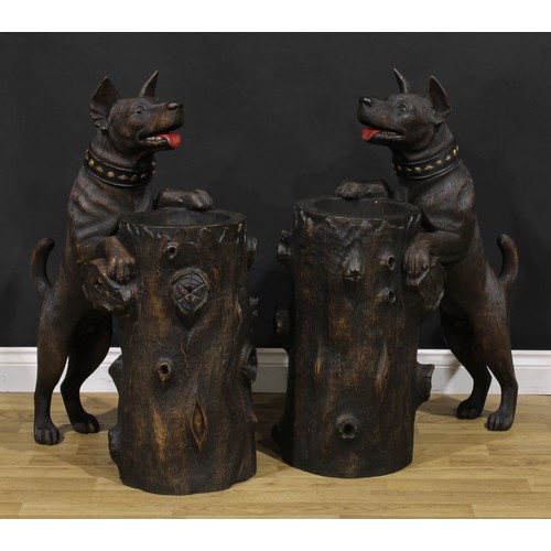 1541 - A pair of mid-20th century Black Forest design hardwood animalier walking stick or umbrella stands, ... 