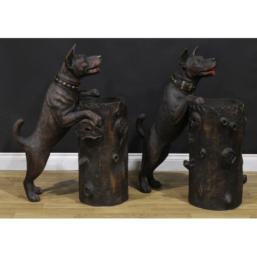 1541 - A pair of mid-20th century Black Forest design hardwood animalier walking stick or umbrella stands, ... 