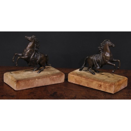 1506 - Continental School, early 20th century, a pair of brown patinated bronze models, rearing horses, 16c... 