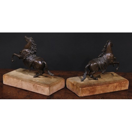 1506 - Continental School, early 20th century, a pair of brown patinated bronze models, rearing horses, 16c... 