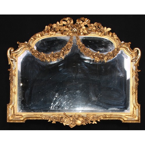 1652 - A Louis XVI Revival giltwood and gesso chimney glass, bevelled mirror plate, the frame applied with ... 