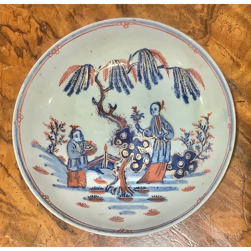 386 - A Chinese canted rectangular meat plate, decorated in tones of underglaze blue with figures in a mon... 