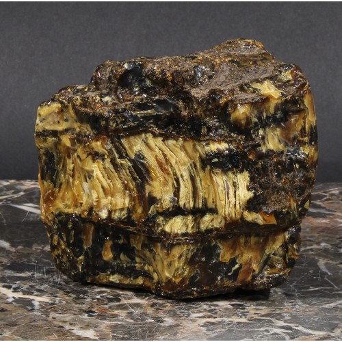 2332 - A large section of raw amber, 11cm x 9.5cm x 6cm